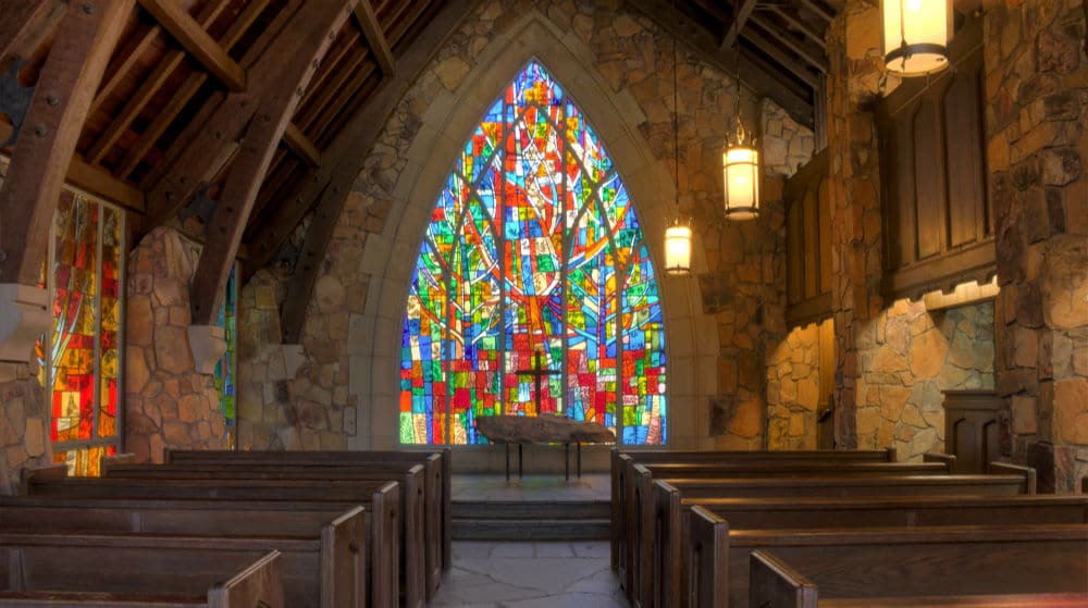 Gorgeous vibrant stained glass windows inside Callaway chapel in Callaway Gardens GA
